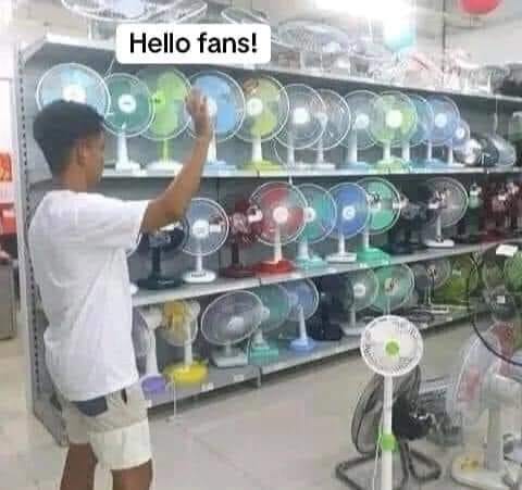 boy looking at rows of fans in a store and waving. The caption reads “Hello fans!”