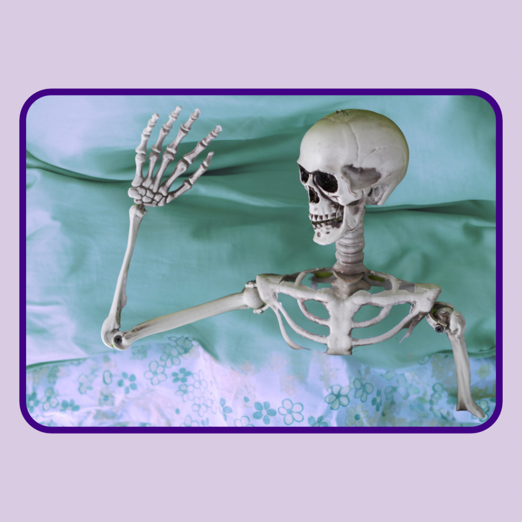 skeleton waving to indicate to small business owners it’s ok to rest.